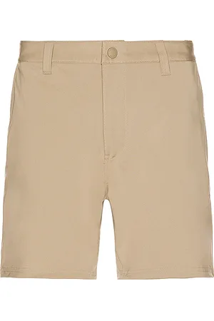 Rhone 7 Commuter Short in - Beige. Size 28 (also in 30).