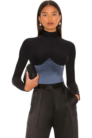 FLEUR DU MAL Mock Neck Long Sleeve Bodysuit in - Black. Size L (also in M, S, XS).