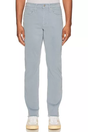 Frame Homem Calças - L'homme Slim Denim Jean in - Blue. Size 28 (also in 30, 33, 34, 36).