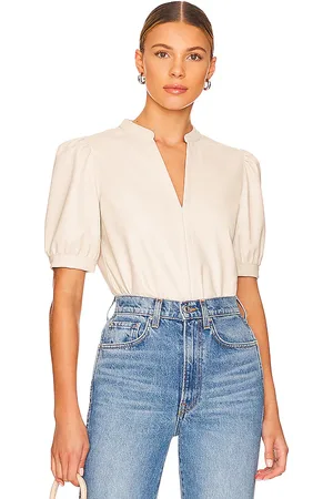 Steve Madden Jane Faux Leather Top in - Cream. Size L (also in M, XL, XS).
