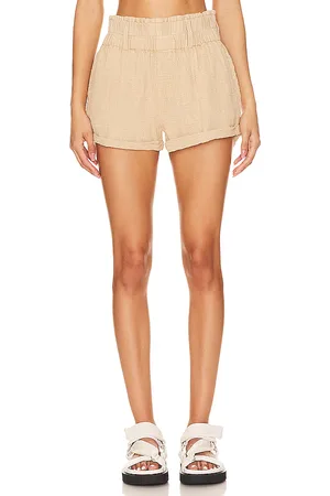 Free People Solar Flare Baja Short in - Beige. Size M (also in XL).