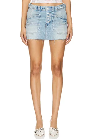 Free People X We The Free x REVOLVE Izzie Denim Mini Skirt in - Denim-Light. Size 28 (also in 29, 30).