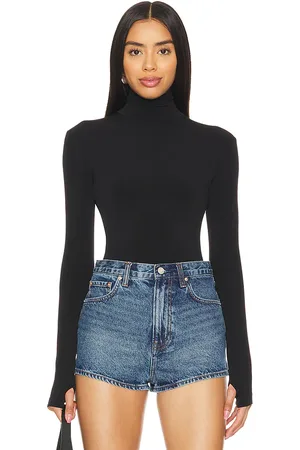 Norma Kamali Slim Fit Long Sleeve Turtleneck Top in - . Size L (also in M, S, XS, XXS).