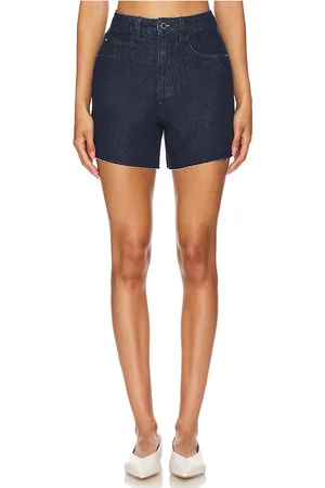 WeWoreWhat High Rise Flare Short in Undone Wash in - Denim-Dark. Size 24 (also in 25, 26, 29).