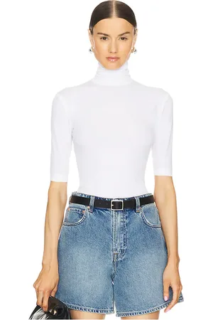 Norma Kamali Slim Fit Short Sleeve Turtleneck Top in N/A - White. Size L (also in M, XL, XS, XXS).