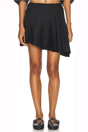 FAITHFULL THE BRAND Antibes Asymmetrical Mini Skirt in - . Size M (also in L, S, XS).