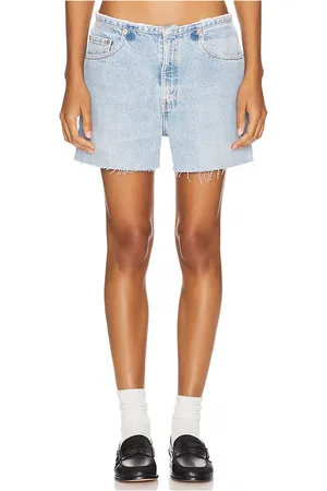 aligrace Undone Mini Rise Short in - Denim-Light. Size 33 (also in 34).