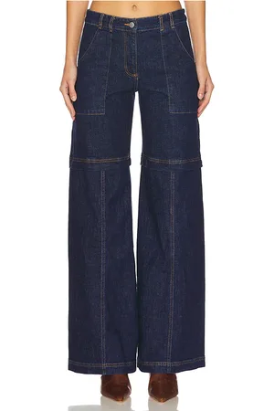 Amanda Uprichard Brady Jeans in - Denim-Dark. Size L (also in M, S).