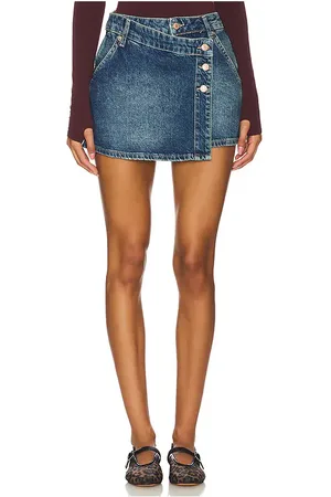 Free People X We The Free Wynne Denim Skirt in - Denim-Medium. Size 24 (also in 25, 29).
