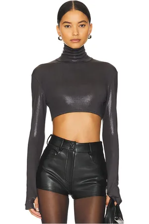 Norma Kamali Cropped Slim Fit Long Sleeve Turtleneck Top in - . Size L (also in XS, XXS).