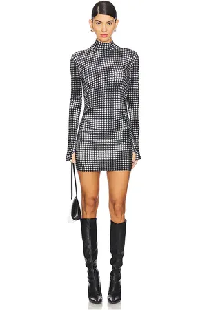 Norma Kamali Long Sleeve Turtleneck Pickleball Dress in - Black,White. Size L (also in M, S, XS, XXS).