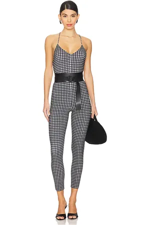 Norma Kamali Low Back Fara Slip Catsuit in - Black. Size L (also in M, S, XL, XS, XXS).