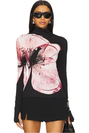 ALICE+OLIVIA Delaina Turtleneck Top in - Black. Size S (also in XS).