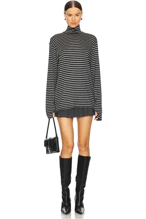 Norma Kamali Long Sleeve Turtleneck Easy Fit Top in - Black. Size M (also in S, XL, XS, XXS).