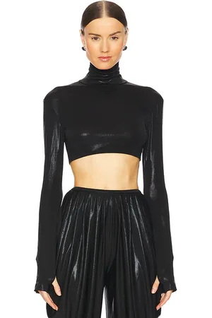 Norma Kamali Cropped Slim Fit Long Sleeve Turtleneck Top in - . Size L (also in M, S, XS, XXS).