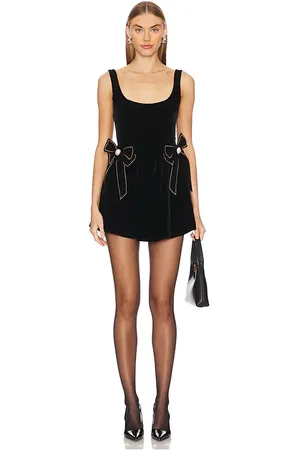 Show Me Your Mumu Ricci Skort Dress in - Black. Size L (also in M, XL).