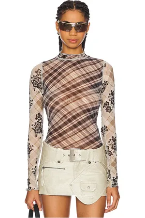 Free People X REVOLVE Chloe Printed Mesh Top in - Black. Size M (also in S, XS).