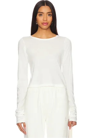 ÉTERNE Long Sleeve Baby Tee in - . Size L (also in M, XL, XS).