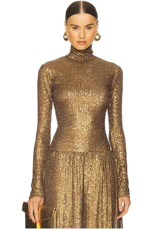 Norma Kamali Slim Fit Long Sleeve Turtleneck Top in - Metallic Gold. Size M (also in S).