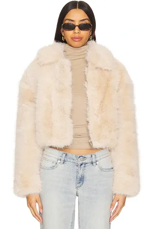 BLANK NYC Crop Faux Fur Jacket in - Cream. Size M (also in S, XS).