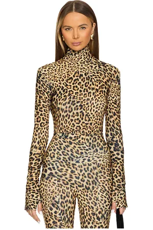 Norma Kamali Slim Fit Long Sleeve Turtleneck Top in - Brown. Size S (also in XS).