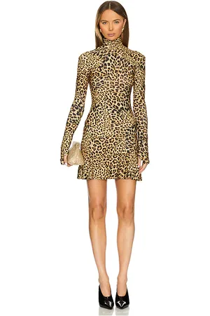 Norma Kamali Long Sleeve Turtleneck Fishtail Mini Dress in - Brown. Size L (also in M, S, XL, XS).