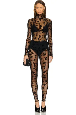Norma Kamali Long Sleeve Slim Fit Turtleneck Catsuit in - Black. Size M (also in S, XL, XS, XXS).