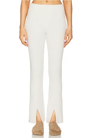 Barefoot Dreams CozyChic Ultra Lite Front Slit Pant in - Cream. Size L (also in M, S, XL, XS).