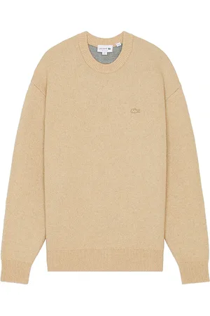 Lacoste Relax Fit Wool Sweater in - Nude. Size L (also in M, S).