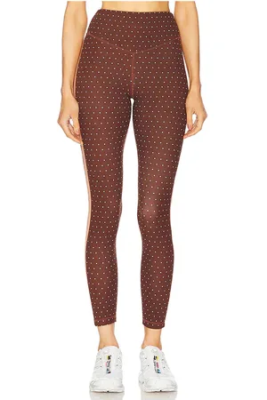 The Upside Maho 25in High Rise Midi Pant in - Brown. Size S (also in XS).