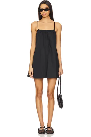 Solid Lindsay Dress in - Black. Size L (also in M, XL).