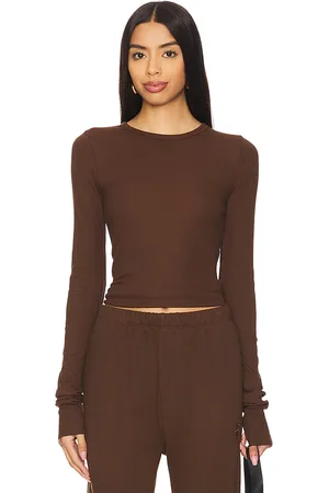 ÉTERNE Long Sleeve Fitted Top in - . Size L (also in S, XL, XS).