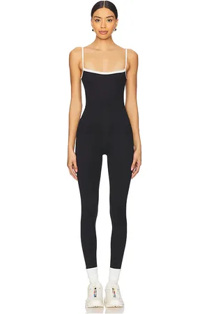 WellBeing + BeingWell FlowWell Este Jumpsuit in - Black. Size M (also in S, XS).
