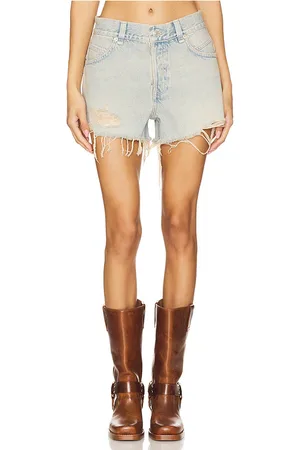 Free People X We The Free Now Or Never Denim Short in - Blue. Size 24 (also in 25, 26, 27, 28, 29, 31, 32).