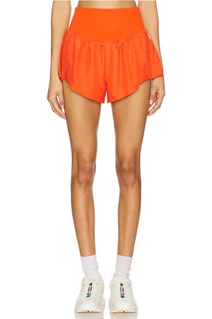 Free People X FP Movement Carpe Diem Short in - Coral. Size L (also in XL, XS).