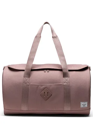 Herschel Heritage Duffle in - Pink. Size all.