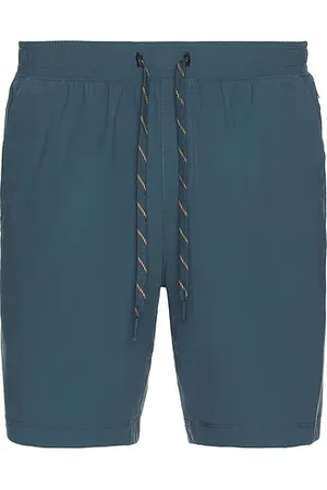 Rhone 7 Pursuit Short in - Teal. Size M (also in S, XL/1X).