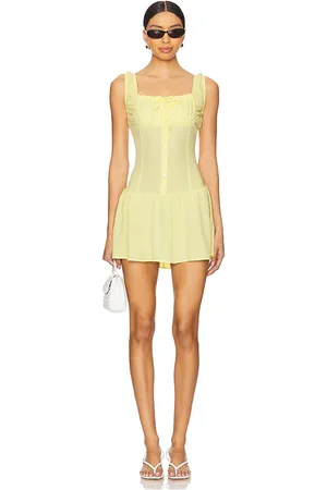 Frankies Bikinis Christa Mini Dress in - Yellow. Size L (also in XL, XS).