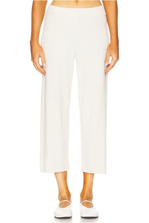Barefoot Dreams CozyChic Ulra Light Side Stripe Crop Pant in - Ivory. Size L (also in M, S, XL, XS).