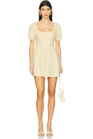 FAITHFULL THE BRAND Dalia Mini Dress in - Lemon. Size L (also in M, S, XL, XS).