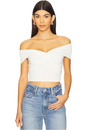 GOOD AMERICAN Raon Jersey Twist Off Top in - Ivory. Size L (also in M, S, XL/1X, XS, XXL/2X, XXXL/3X, XXXXL/4X).