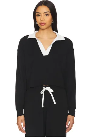 Splits59 Joan Fleece Polo Long Sleeve Top in - Black. Size M (also in S, XS).