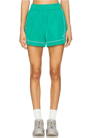 alo Motivate Track Short in - Green. Size M (also in S, XS).