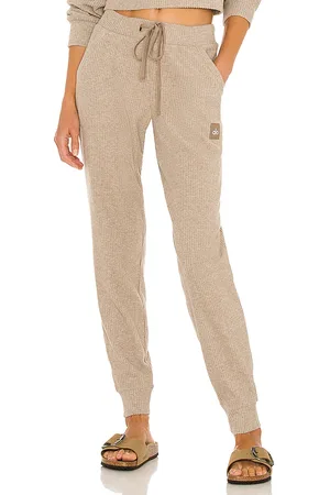 alo Muse Jogger in - Tan. Size S (also in L, M, XS).