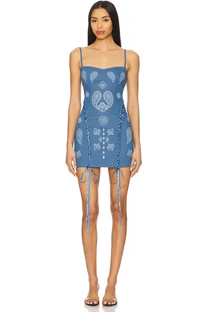 Leslie Amon X REVOLVE Lace Up Denim Mini Dress in - . Size L (also in M, S, XL, XS).
