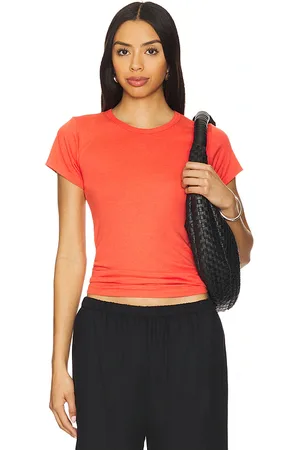 ÉTERNE Fitted Crewneck Short Sleeve Top in - Red. Size L (also in M, S, XL, XS).