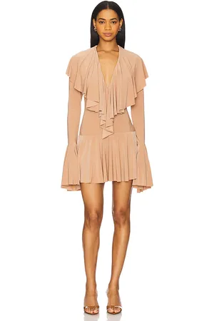 Norma Kamali Long Sleeve Ruffle Mini Dress in - Nude. Size L (also in M, S).