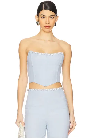 La Porte Birkin Pearl Corset Top in - Baby Blue. Size L (also in M, S, XL, XS).