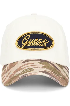 Guess Vintage Trucker Hat in - Cream. Size all.