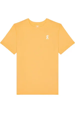 On Running Core-T in - Orange. Size M (also in S, XL/1X).